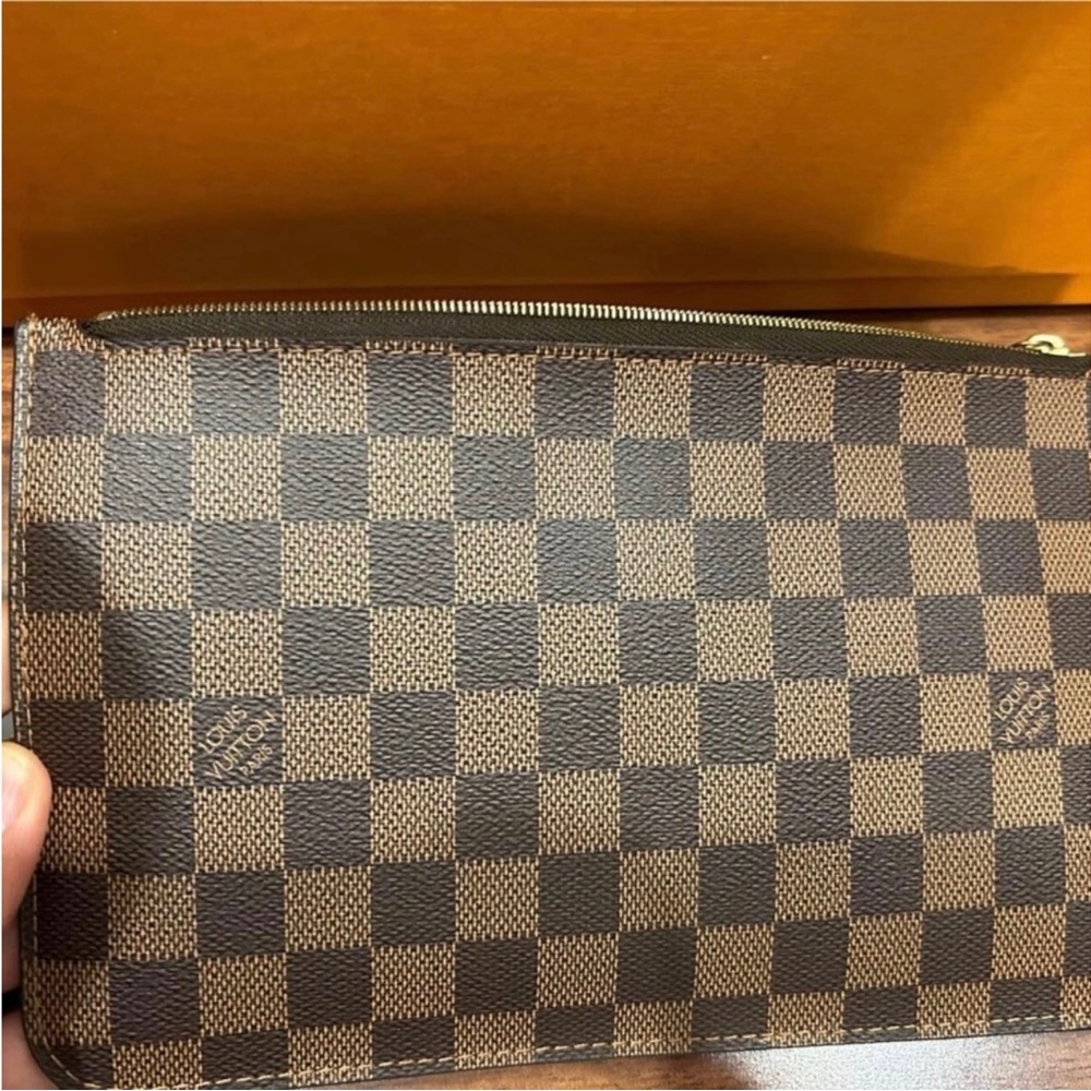 Louis Vuitton wristlet. Came from neverful MM